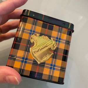 Two Mac makeup containers